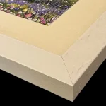 alum bay, the corner of a print in a white frame by Isle of Wight artist Julia Tanner