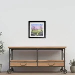 cherry blossom, a painting by Julia Tanner Art, framed in black and displayed in a room setting