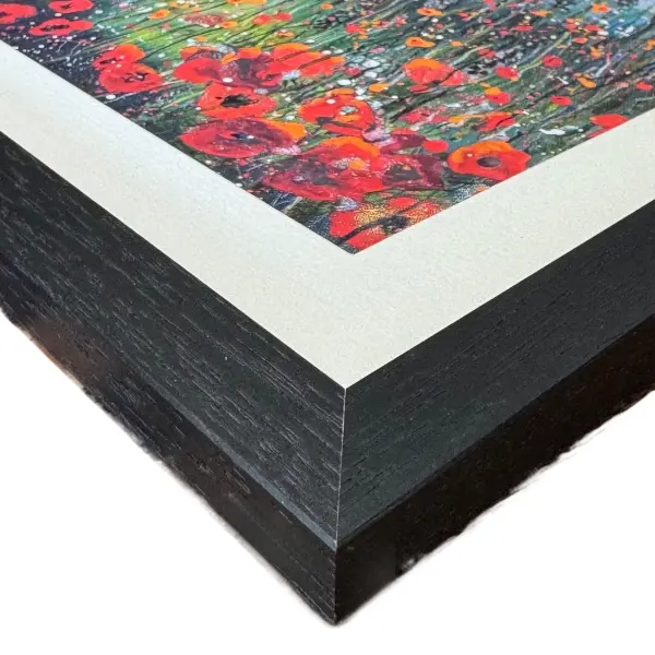 poppies black frame corner poppies, the corner of a print in a black frame by Isle of Wight artist Julia Tanner
