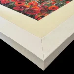 poppies, the corner of a print in a white frame by Isle of Wight artist Julia Tanner