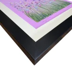 the corner of pretty in pink in a mount and a black frame by isle of white artist Julia Tanner