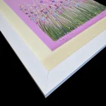 a photo of the corner of pretty in pink in a mount and white frame by Isle of Wight artist Julia Tanner