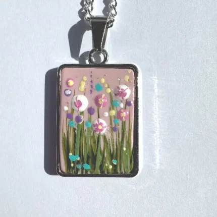 a hand painted necklace by Julia Tanner