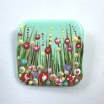 terrific in teal square flower meadow brooch by Julia Tanner