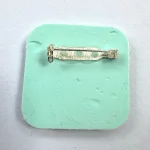 reverse side of turquoise brooch by Julia Tanner Art