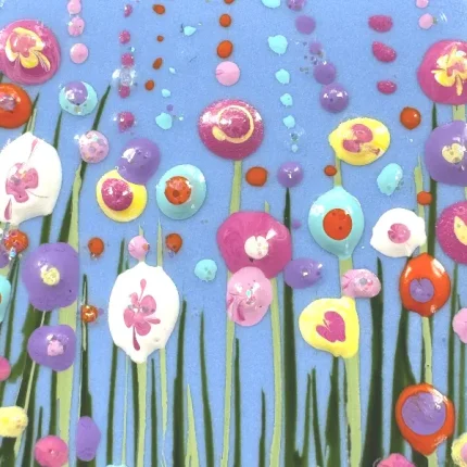 detail of flowers on blue flower meadow brooch by Isle of Wight artist Julia tanner