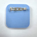 reverse side of blue brooch by Julia tanner