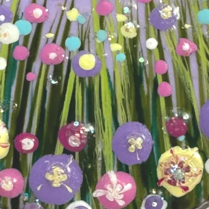 close up detail of a hand painted flower meadow necklace by Julia tanner art