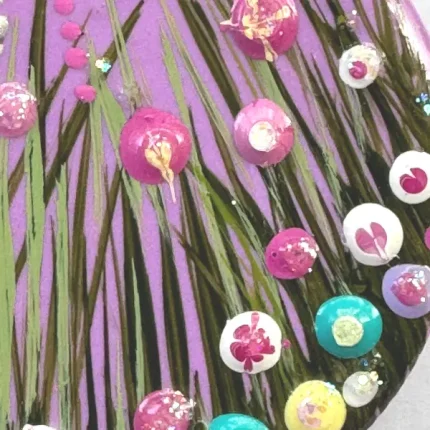 details of the flowers on a flower meadow brooch by Julia tanner