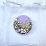 lilac round flower meadow brooch with hand painted flowers
