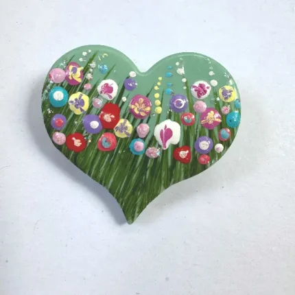 turquoise heart flower meadow brooch with a hand painted flower meadow by Julia tanner art