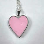 the reverse side of a pink pendant by Julia tanner art