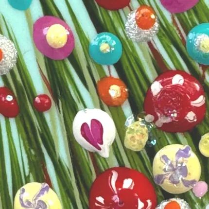 close up detail of a turquoise flower meadow brooch by Julia tanner