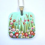 a turquoise square flower meadow necklace by Julia Tanner Art